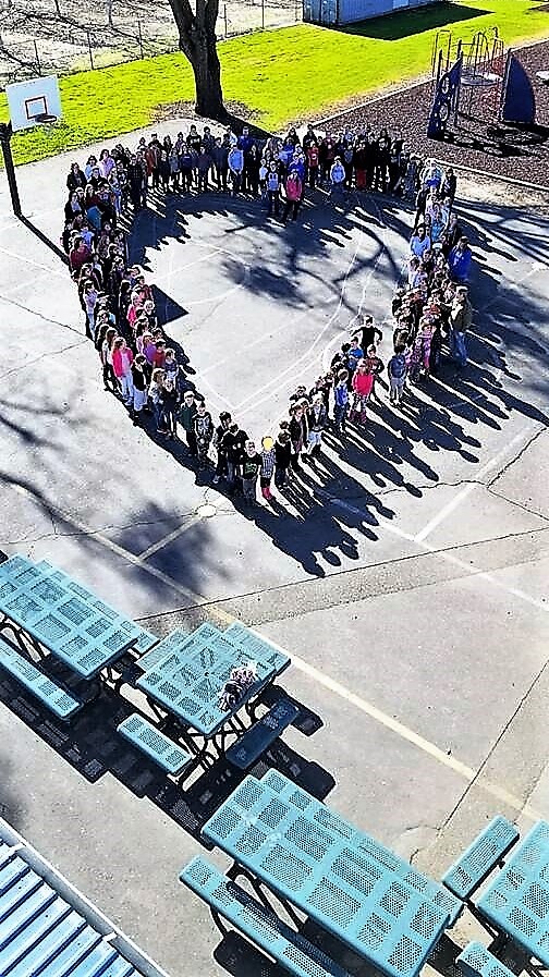Many students on blacktop aerial photo